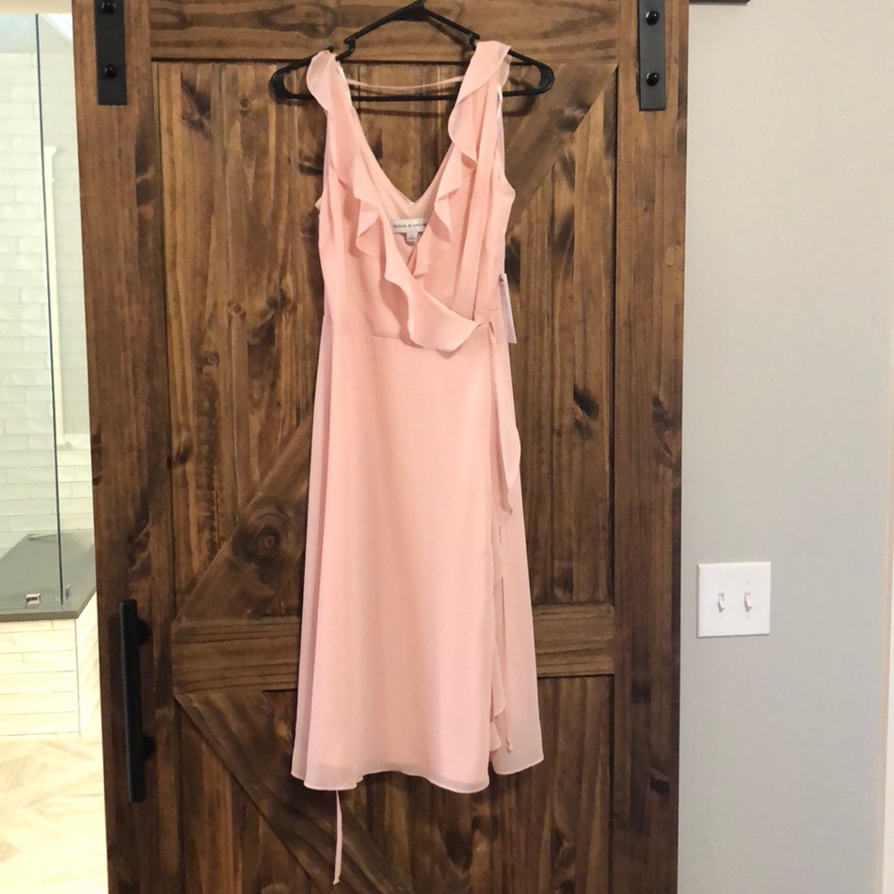 Light pink wraparound ruffle dress